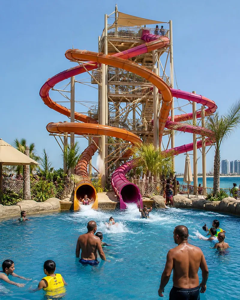 Water slides and pool at a water park