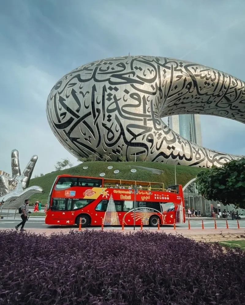 City Sightseeing bus passing the Museum of the Future
