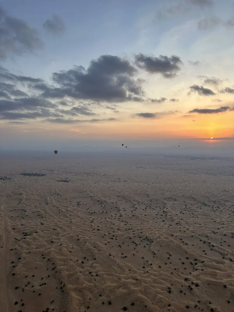 The UAE desert at sunrise seen from a hot-air balloon