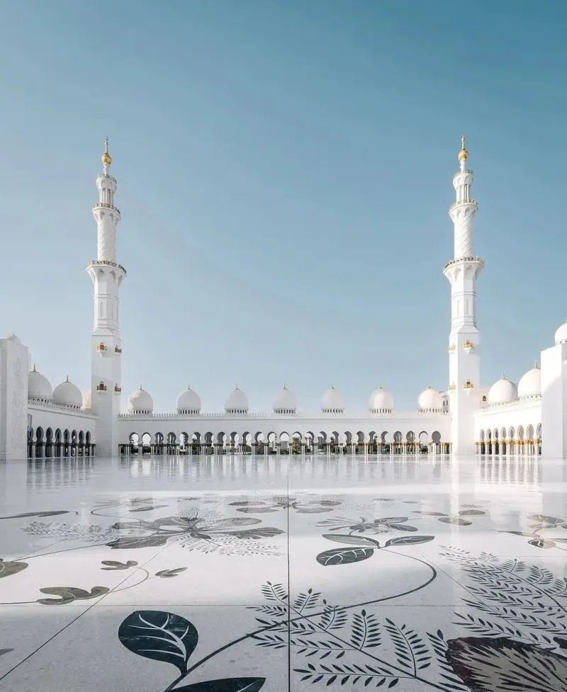Marble courtyard and minarets of the Sheikh Zayed Grand Mosque