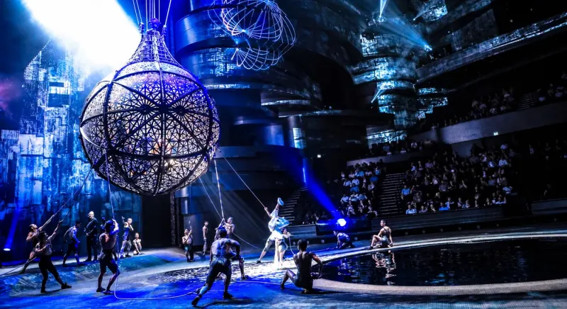 Aerial performers above the water stage of La Perle