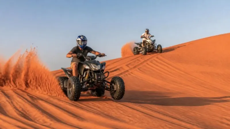 Illustration (generated image): quad bikes on desert dunes