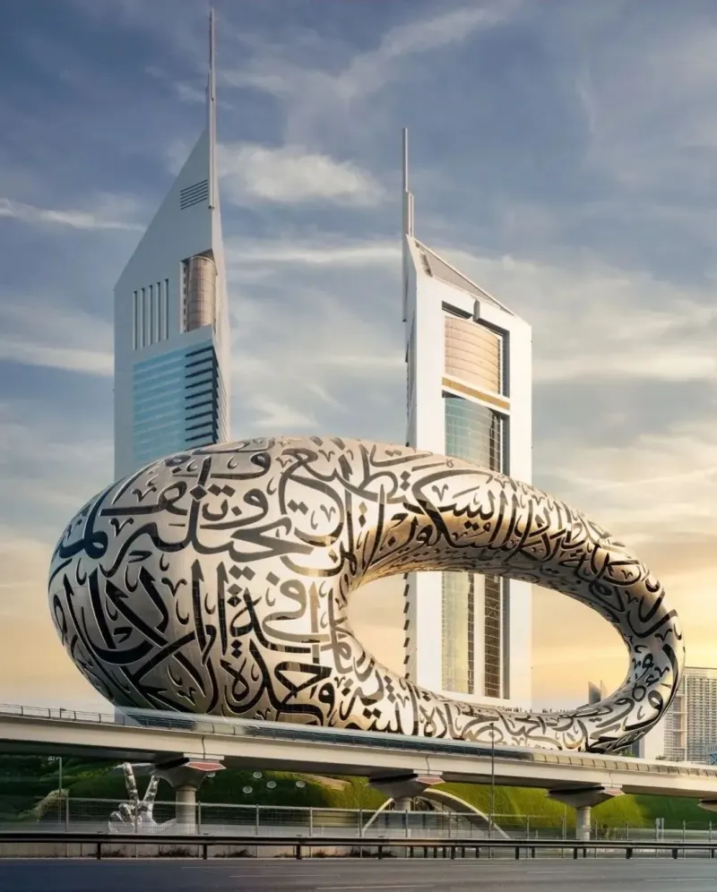 Museum of the Future with its calligraphy façade, Emirates Towers behind